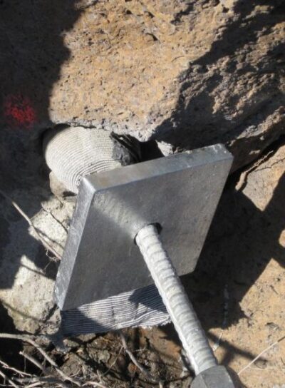 Rock bolt filled with grout